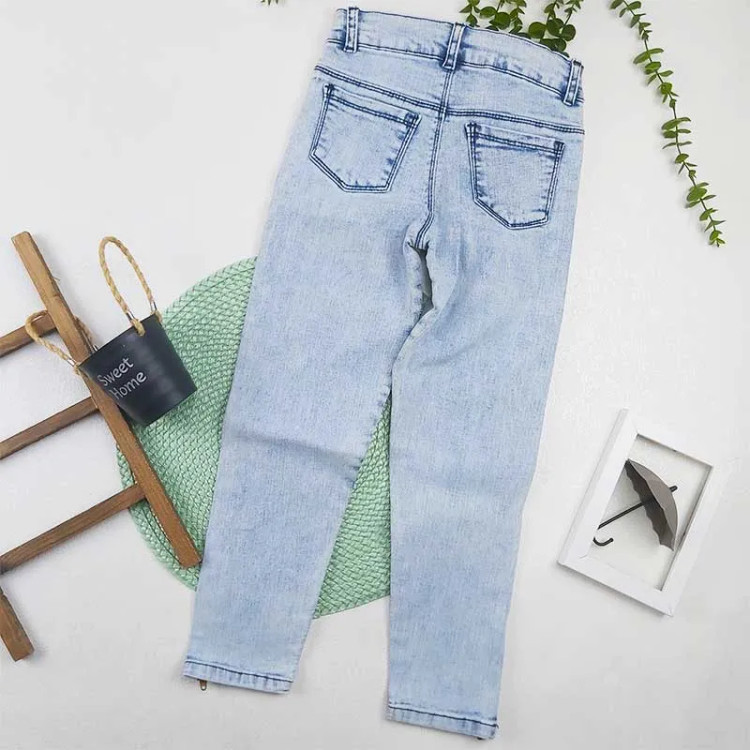 شلوار جین دخترانه دم پا زیپ آبی یخی جذب مناسب 8 تا 13 سال